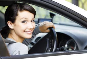 girl-smiling-inside-car